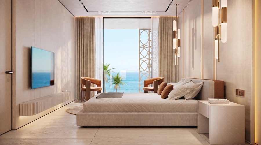 A furnished bedroom within a branded residence